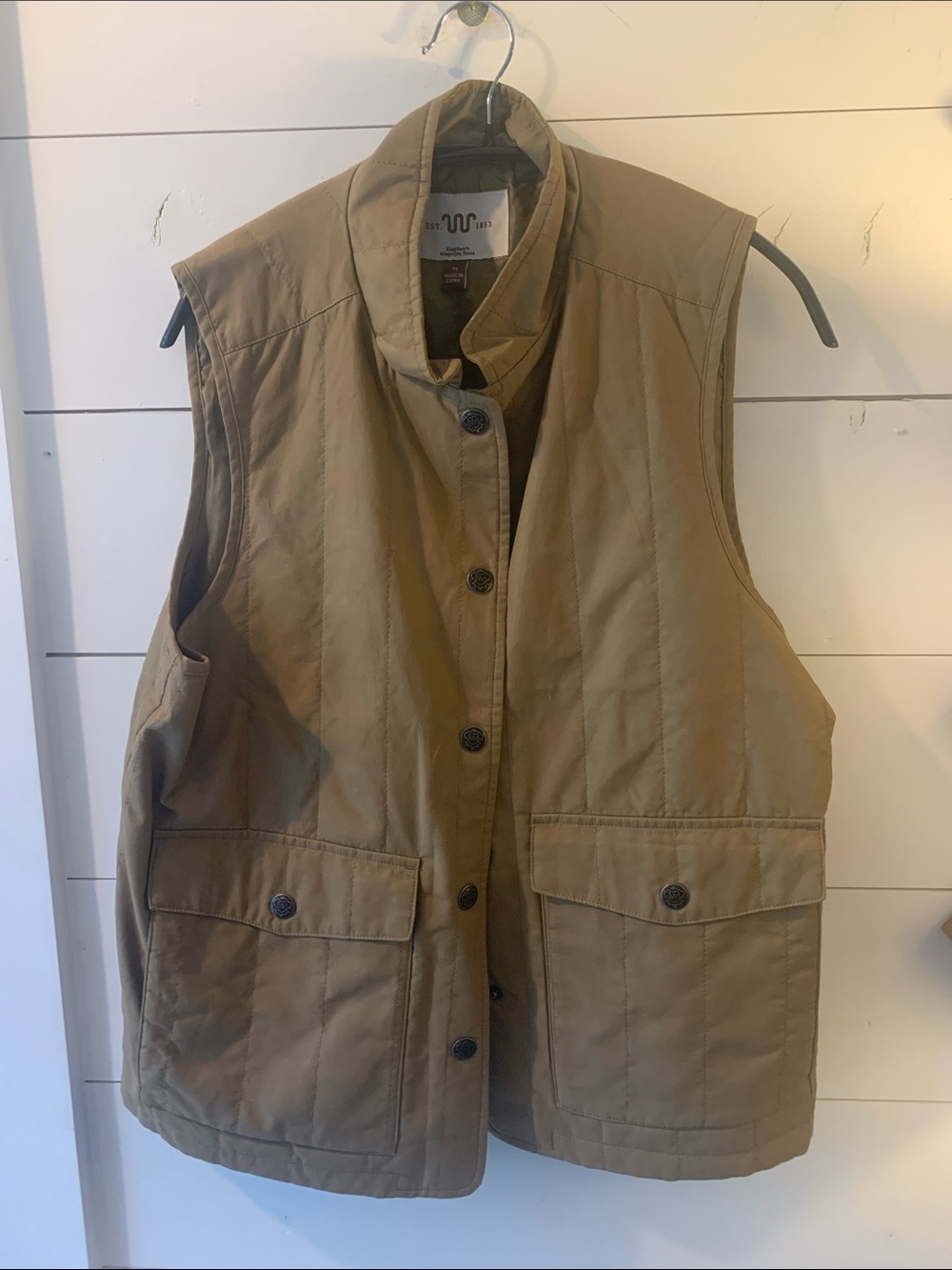 King Ranch vest size medium 
Tan canvas, new with tags.  25” length.